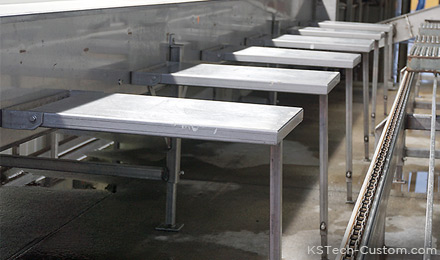 produce boxing tables along sorting conveyor
